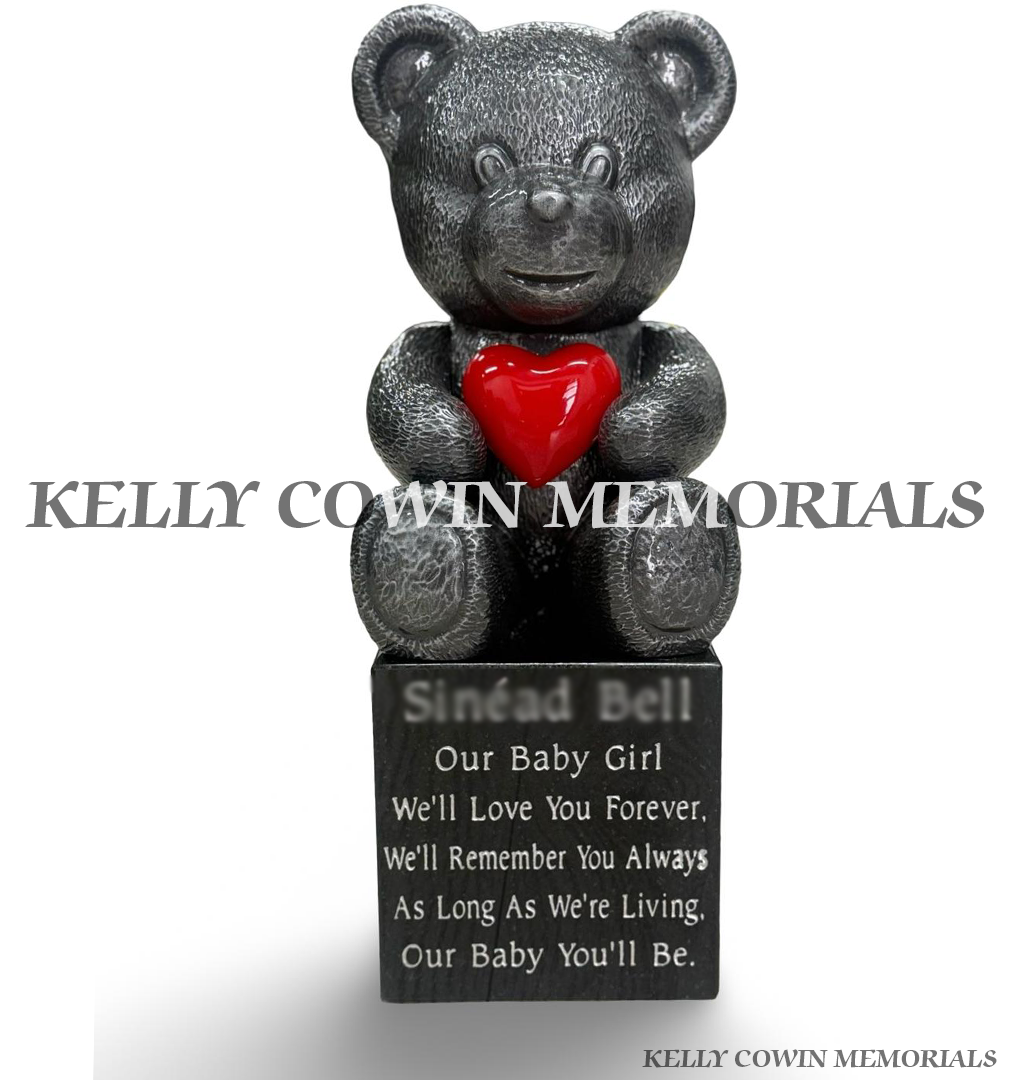 Silver ceramic teddy bear holding a red heart on a personalised black granite memorial block for a baby or child by Kelly Cowin Memorials.