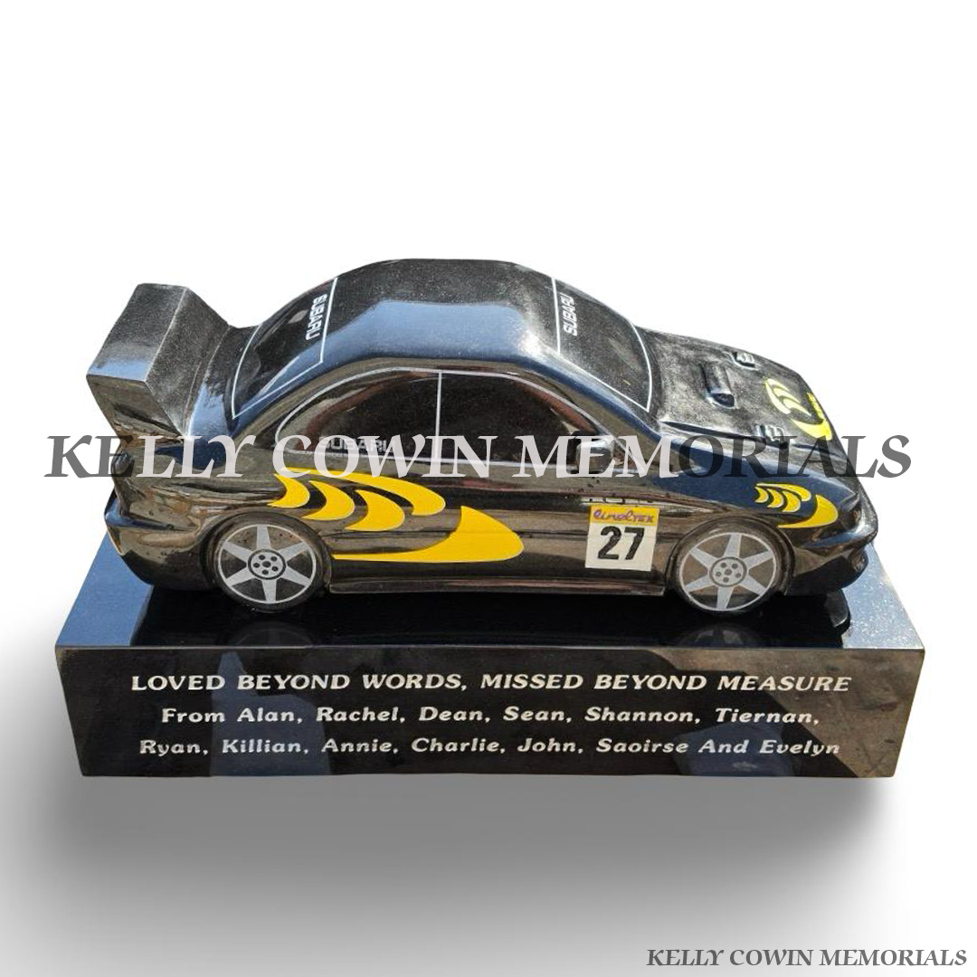 Custom black granite Subaru rally car memorial on polished granite plinth with personalised silver inscription.