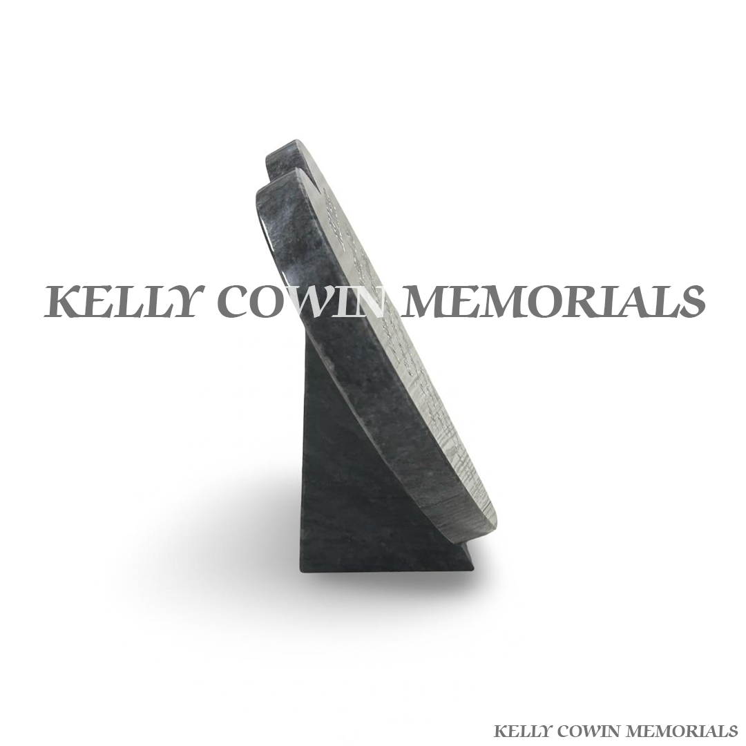side view of 12 inch Blue Lagoon granite heart memorial plaque with personalised silver engraved inscription, handcrafted by Kelly Cowin Memorials for graves, cremation memorials and remembrance gardens throughout Dublin and Ireland.