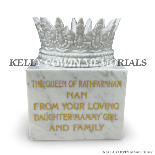 Front view of white marble crown memorial ornament with gold lettering