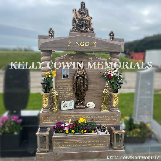 Front view of Woodlawn granite Gates of Heaven headstone with gold leaf inscription