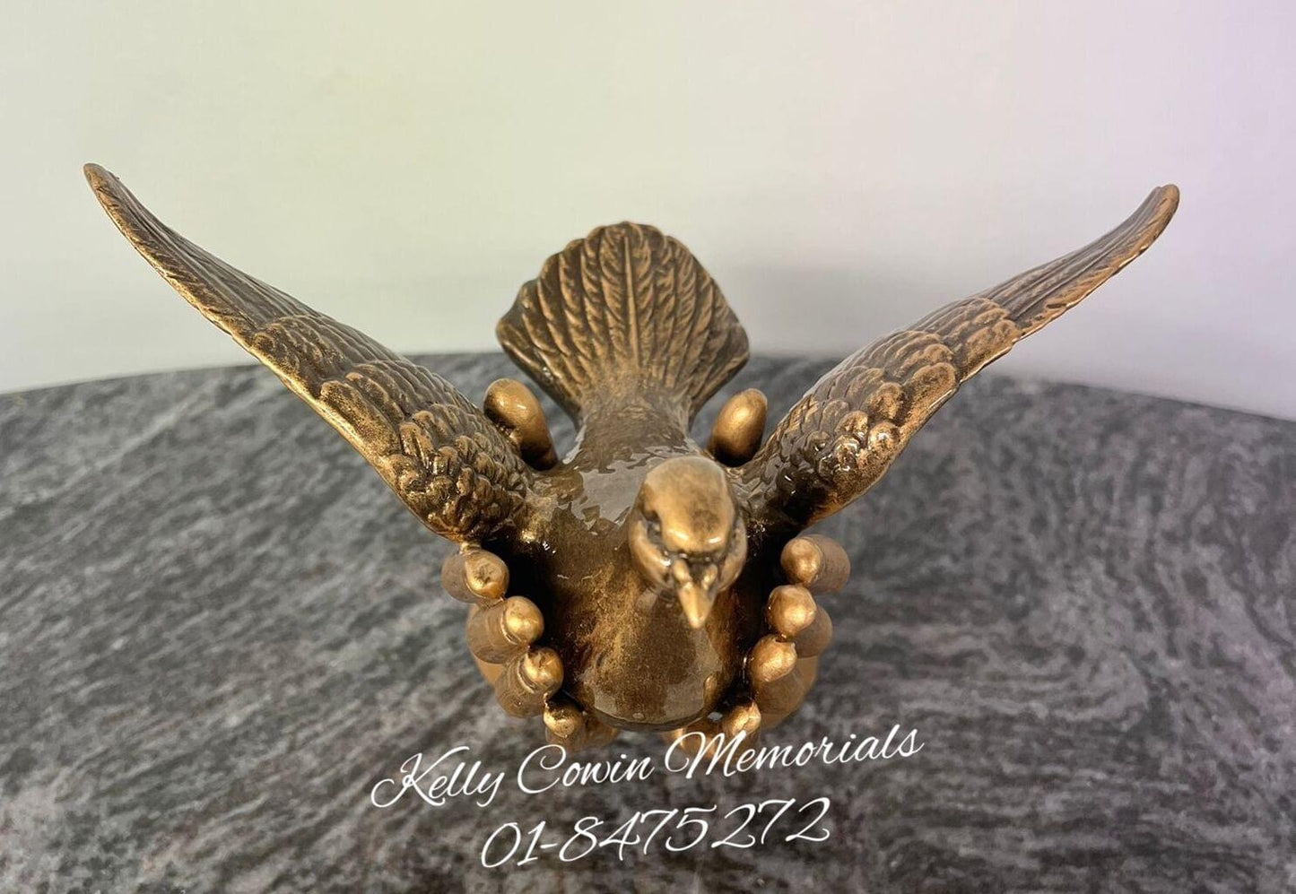 S026 - Bronze Dove In Hands